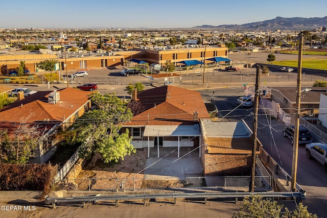 birds eye view of property with a residential view and a mountain view