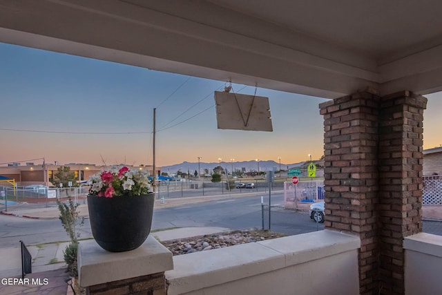 patio terrace at dusk with fence