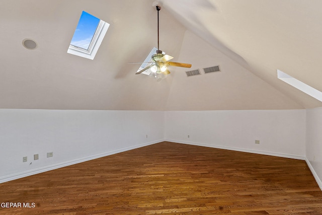 624 Mount Cristo Rey Ln, El Paso, TX 79922 - bonus room featuring a skylight, ceiling fan, vaulted ceiling, wood finished floors, and baseboards