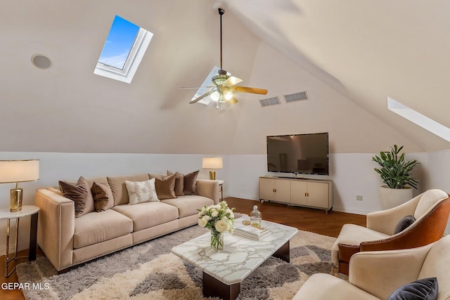 624 Mount Cristo Rey Ln, El Paso, TX 79922 - living room featuring a skylight, a ceiling fan, wood finished floors, lofted ceiling, and baseboards