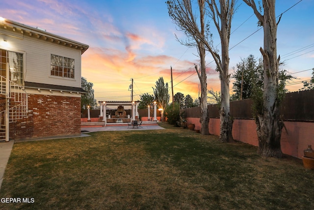 624 Mount Cristo Rey Ln, El Paso, TX 79922 - yard at dusk with a patio