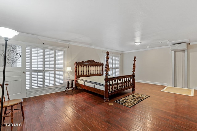 624 Mount Cristo Rey Ln, El Paso, TX 79922 - bedroom featuring crown molding, wood finished floors, multiple windows, and baseboards