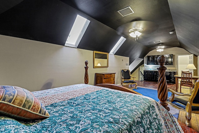 624 Mount Cristo Rey Ln, El Paso, TX 79922 - bedroom with lofted ceiling and wood finished floors