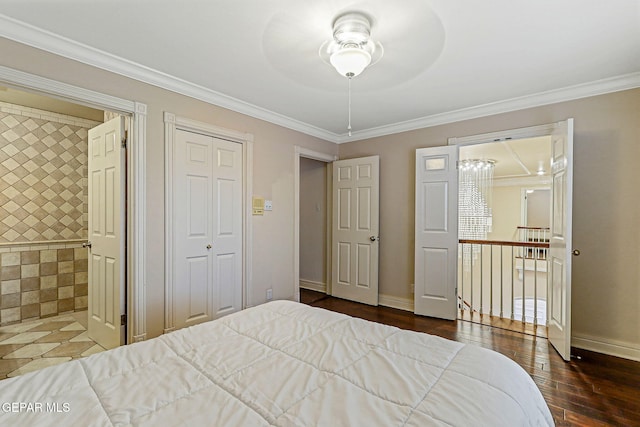 624 Mount Cristo Rey Ln, El Paso, TX 79922 - bedroom with wood finished floors, baseboards, and ornamental molding
