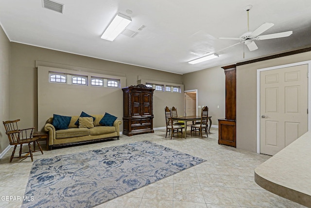 624 Mount Cristo Rey Ln, El Paso, TX 79922 - living room featuring light tile patterned flooring, ceiling fan, and baseboards