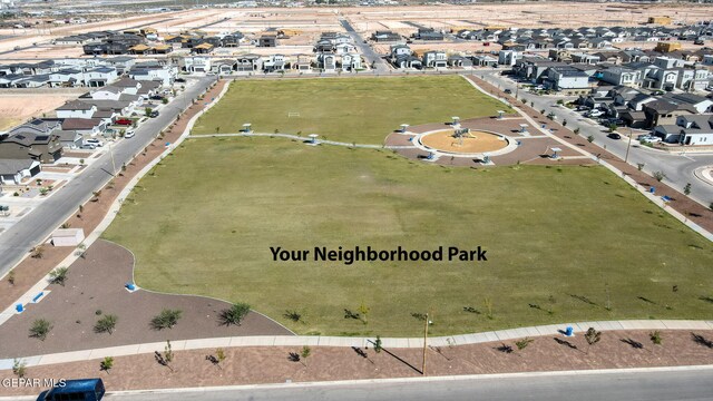birds eye view of property with a residential view
