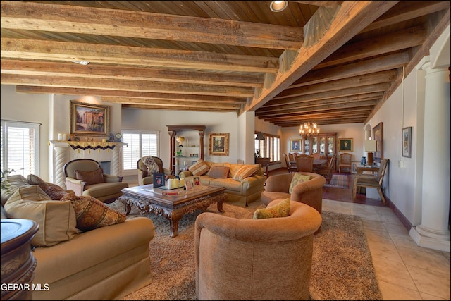 5401 Tierra Vista Dr, El Paso, TX 79932 - living room with a chandelier, wood ceiling with exposed beams, light tile patterned floors, baseboards, and a fireplace