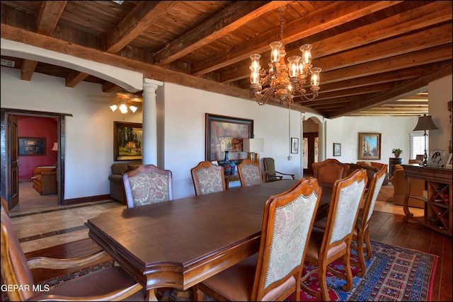 5401 Tierra Vista Dr, El Paso, TX 79932 - dining room featuring arched walkways, wooden ceiling with exposed beams, a chandelier, a ceiling fan, and wood-type flooring