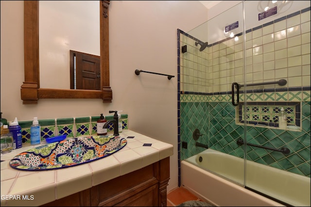 5401 Tierra Vista Dr, El Paso, TX 79932 - bathroom featuring vanity and combined bath / shower with glass door