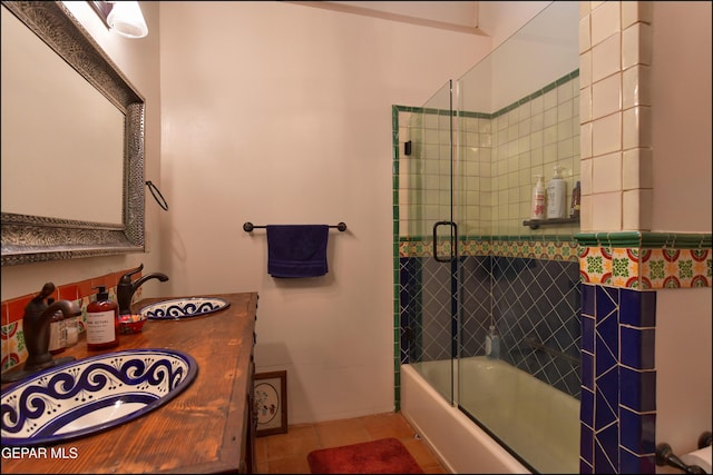 5401 Tierra Vista Dr, El Paso, TX 79932 - full bath with a sink, enclosed tub / shower combo, and tile patterned flooring