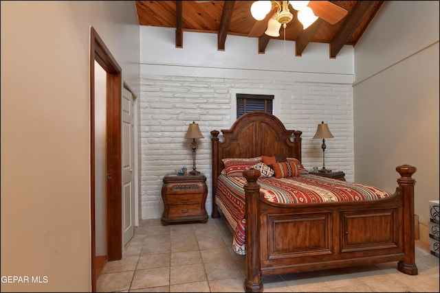 5401 Tierra Vista Dr, El Paso, TX 79932 - bedroom with wooden ceiling with exposed beams, brick wall, and light tile patterned floors