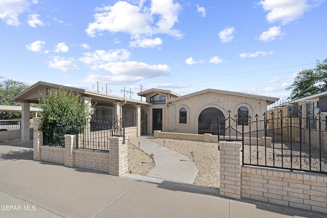 4808 Sagittarius Ave, El Paso, TX 79924 - view of front of home with a fenced front yard and brick siding