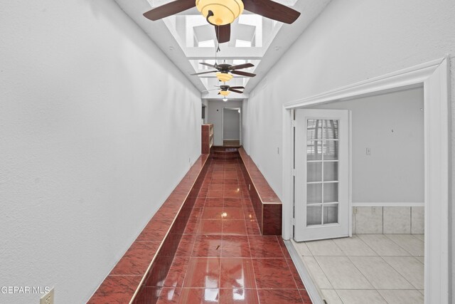 4808 Sagittarius Ave, El Paso, TX 79924 - corridor with a skylight and tile patterned floors
