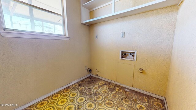 6001 Canton Ct, El Paso, TX 79905 - washroom with laundry area, tile patterned floors, washer hookup, and baseboards