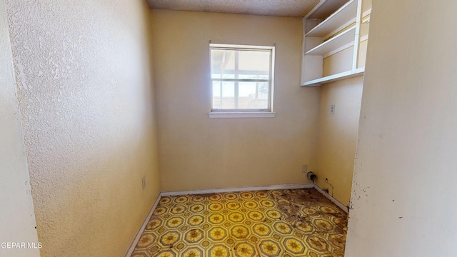 6001 Canton Ct, El Paso, TX 79905 - laundry area featuring laundry area, baseboards, and tile patterned floors