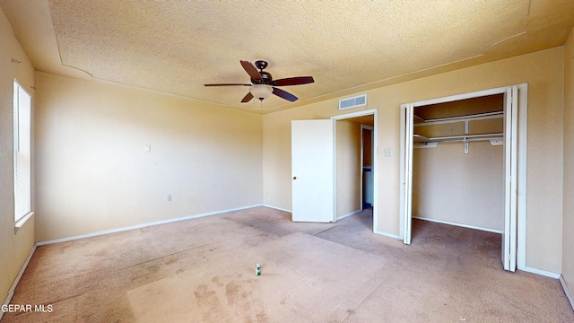 6001 Canton Ct, El Paso, TX 79905 - unfurnished bedroom featuring visible vents, a textured ceiling, and carpet floors