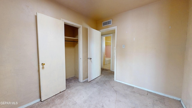 6001 Canton Ct, El Paso, TX 79905 - unfurnished bedroom featuring visible vents, baseboards, a closet, and light carpet