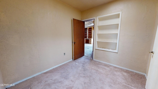 6001 Canton Ct, El Paso, TX 79905 - unfurnished bedroom with baseboards and carpet