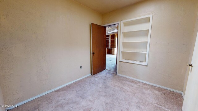 6001 Canton Ct, El Paso, TX 79905 - unfurnished bedroom with baseboards and carpet