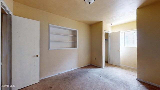 6001 Canton Ct, El Paso, TX 79905 - unfurnished bedroom featuring carpet floors