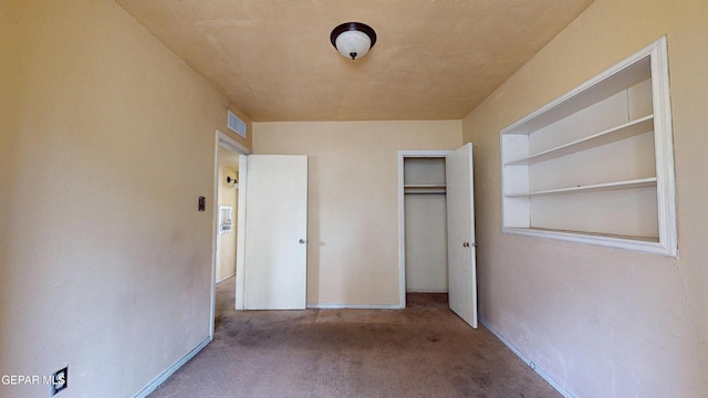 6001 Canton Ct, El Paso, TX 79905 - unfurnished bedroom featuring carpet flooring, baseboards, visible vents, and a closet