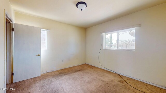 6001 Canton Ct, El Paso, TX 79905 - spare room featuring carpet