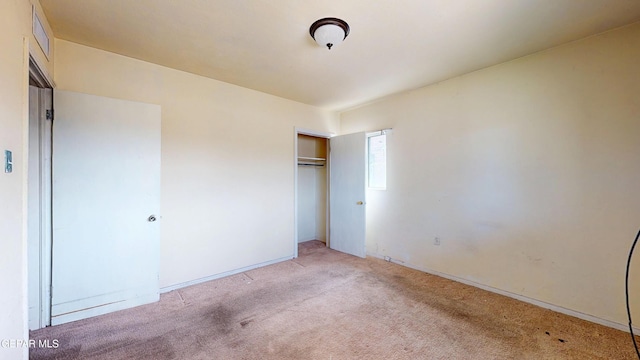 6001 Canton Ct, El Paso, TX 79905 - unfurnished bedroom featuring a closet, carpet flooring, and visible vents
