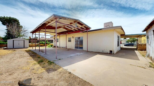 6001 Canton Ct, El Paso, TX 79905 - back of house with an outbuilding and a storage shed