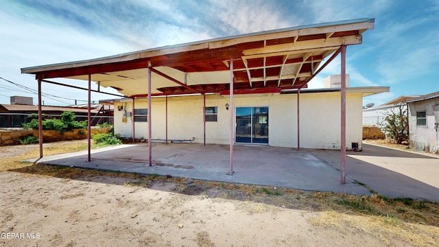 6001 Canton Ct, El Paso, TX 79905 - back of property featuring fence and a carport