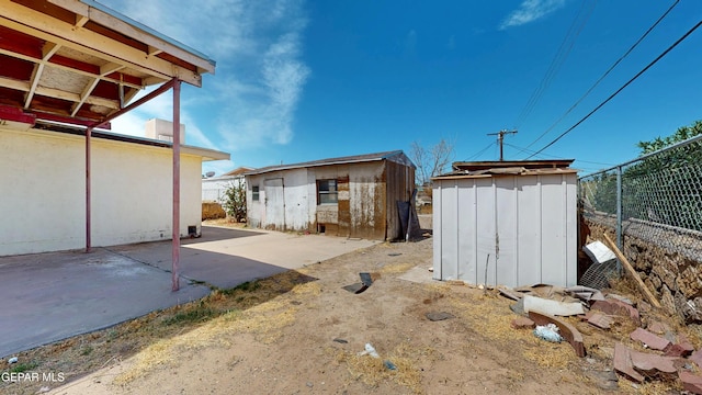 6001 Canton Ct, El Paso, TX 79905 - view of shed featuring fence