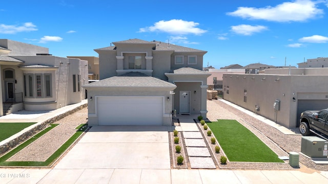 view of front facade featuring a garage, stucco siding, driveway, and a residential view