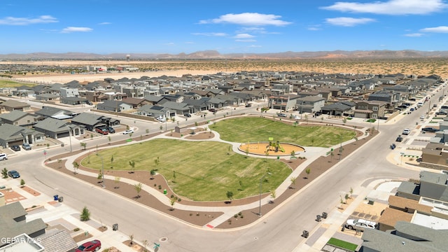 aerial view with a mountain view and a residential view