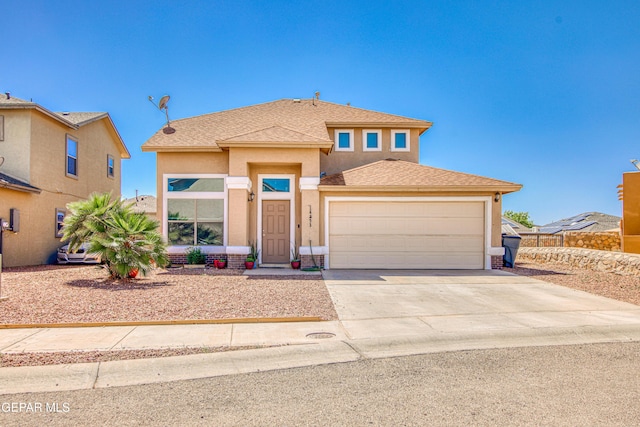 14253 Hacienda Rock Dr, El Paso, TX 79938 - view of front of home featuring stucco siding, an attached garage, driveway, and a shingled roof