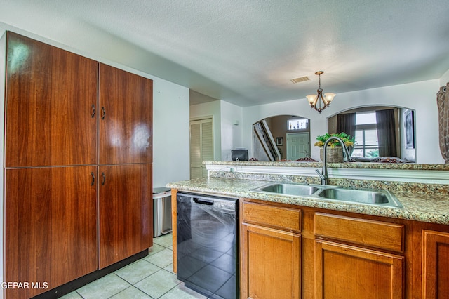 14253 Hacienda Rock Dr, El Paso, TX 79938 - kitchen with black dishwasher, a sink, arched walkways, light tile patterned floors, and a chandelier