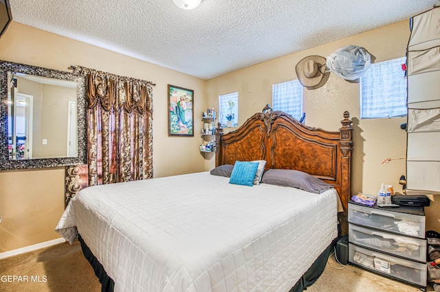 14253 Hacienda Rock Dr, El Paso, TX 79938 - carpeted bedroom with a textured ceiling