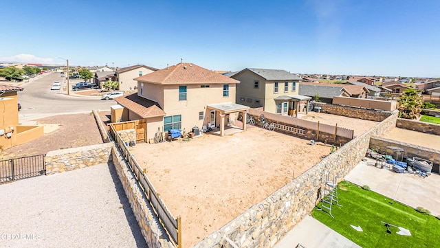 14253 Hacienda Rock Dr, El Paso, TX 79938 - view of yard featuring a residential view and fence