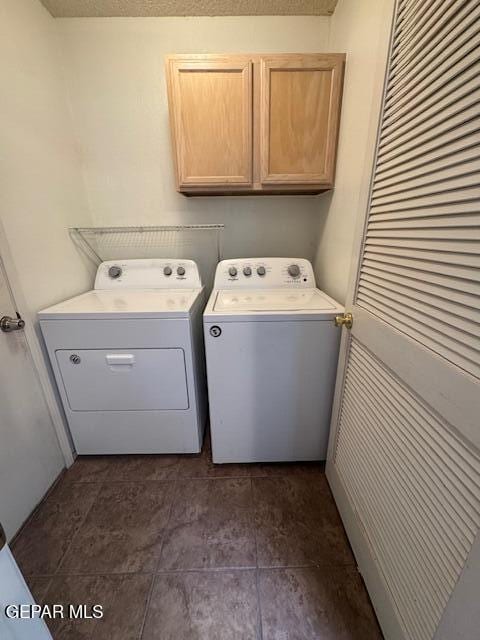 laundry area featuring cabinet space and washing machine and dryer