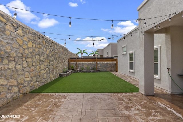 13106 Salterton Ave, El Paso, TX 79928 - view of yard featuring a fenced backyard and a patio area