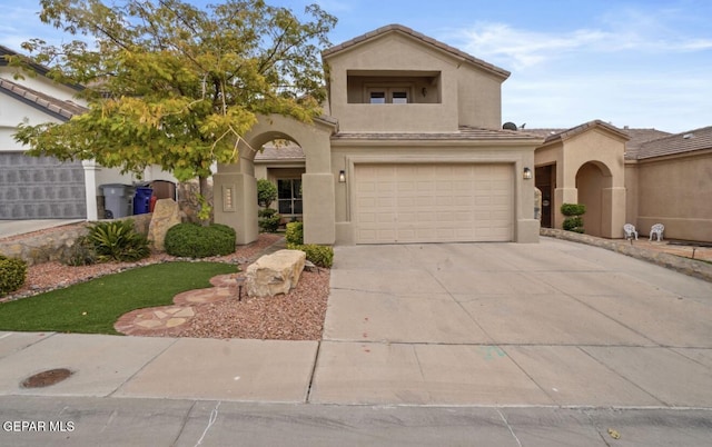 12164 Sitting Bull Dr, El Paso, TX 79936 - view of front of house with stucco siding, concrete driveway, an attached garage, and a tiled roof