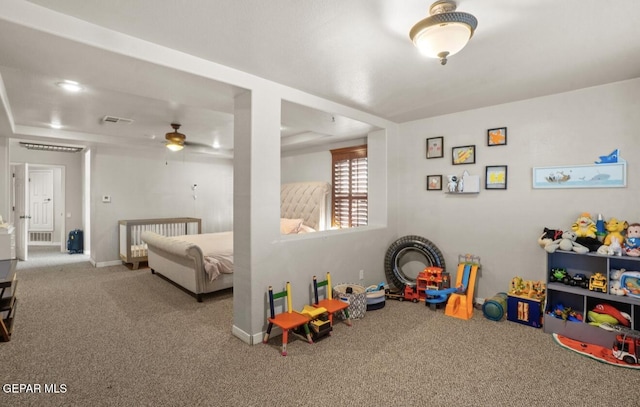 12164 Sitting Bull Dr, El Paso, TX 79936 - playroom featuring carpet floors, ceiling fan, and baseboards
