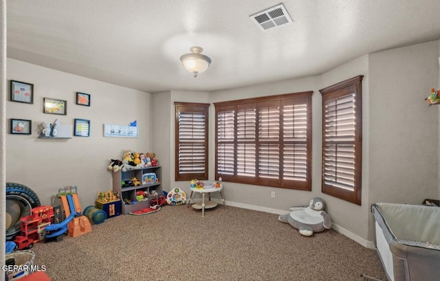 12164 Sitting Bull Dr, El Paso, TX 79936 - rec room with carpet and baseboards