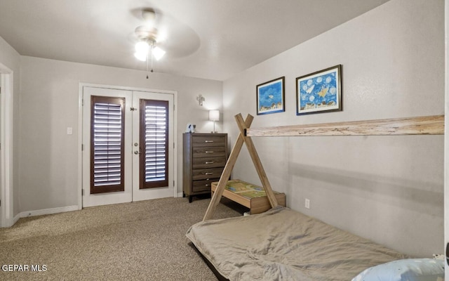 12164 Sitting Bull Dr, El Paso, TX 79936 - carpeted bedroom with french doors, a ceiling fan, and baseboards