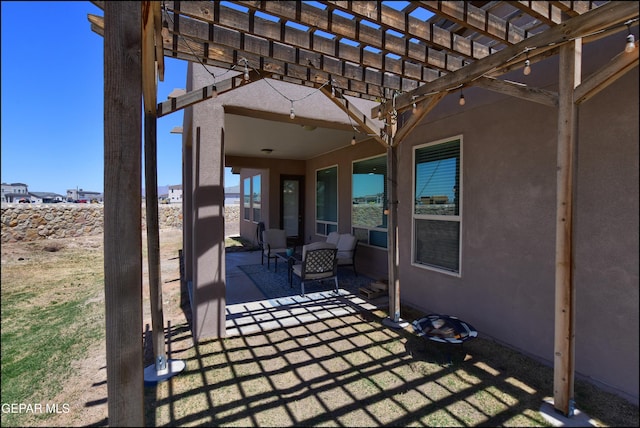 view of patio / terrace featuring a pergola