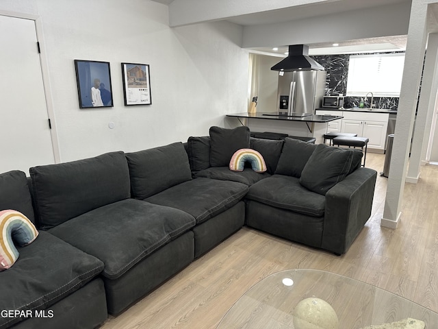 living area with light wood-style floors