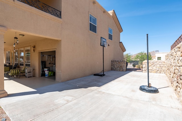 view of patio / terrace featuring fence