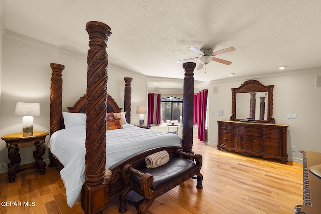1859 Luis Gomez Place, El Paso, TX 79936 - bedroom featuring wood finished floors, a textured ceiling, crown molding, a ceiling fan, and recessed lighting