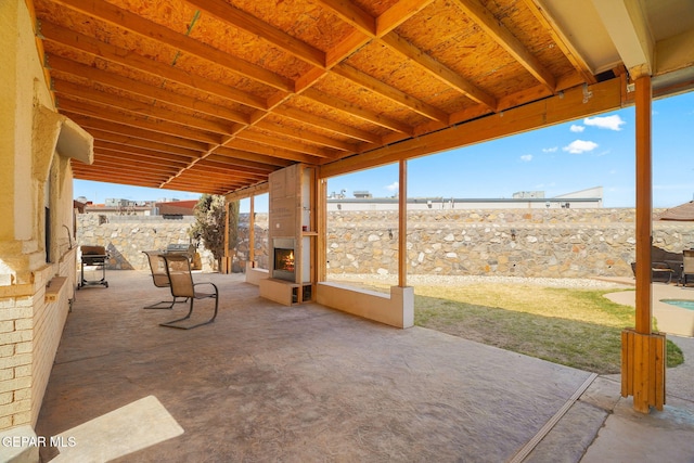 1859 Luis Gomez Place, El Paso, TX 79936 - view of patio with a large fireplace and a fenced backyard