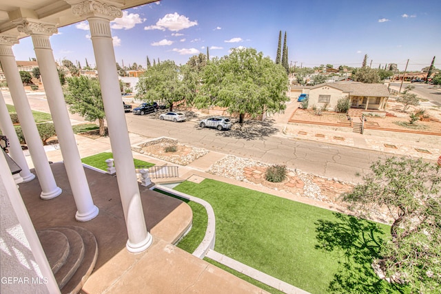 view of yard featuring covered porch