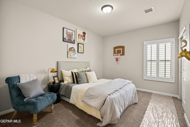 921 Raegil St, El Paso, TX 79928 - carpeted bedroom featuring baseboards