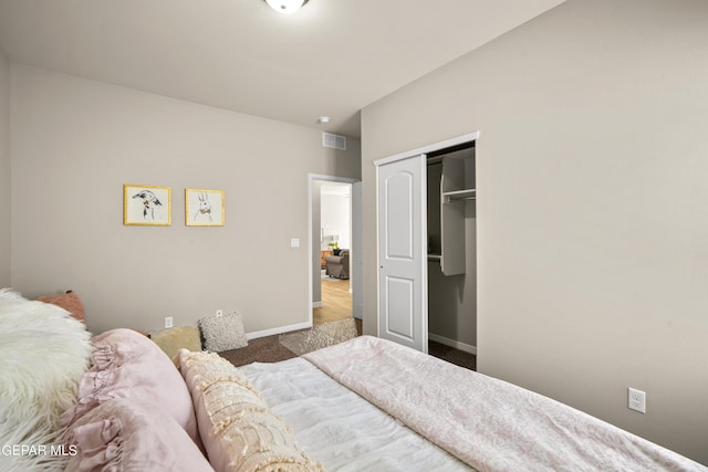 921 Raegil St, El Paso, TX 79928 - carpeted bedroom with baseboards and a closet